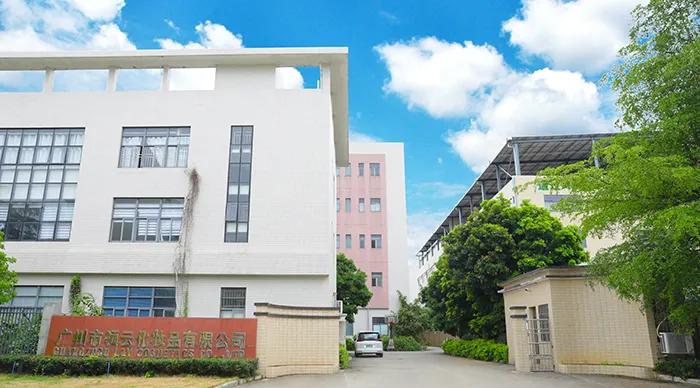 Modern hair care and cosmetic manufacturing workshop with automated production lines, quality control stations, and professional manufacturing equipment